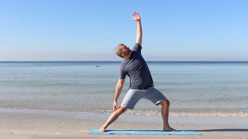 christian yoga on the beach reverse warrior