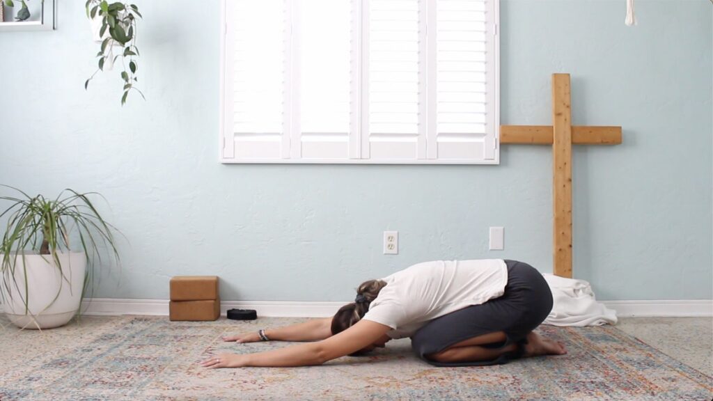 Christian yoga childs pose